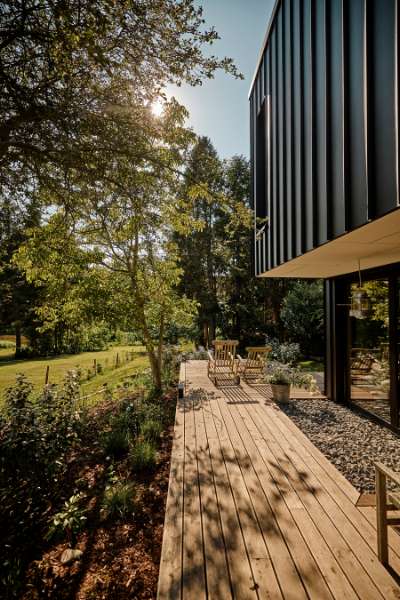 Architect pays attention to the details in a villa with a natural view and façade cladding in steel and stone, Konsul Lorenzen Straße 5, 24376 Kappeln, Germany